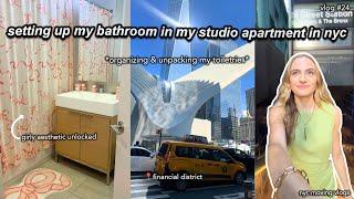 moving to nyc vlog 24. setting up my bathroom in my studio apartment, organizing makeup & skincare