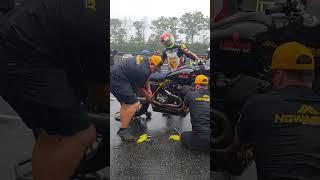 Team Nowaskey changes header in the rain during The King Of The Baggers - Championship Practice Lap