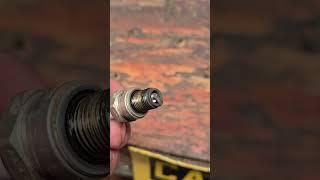 Can anybody guess why the spark plug looks like this?
