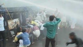 Indian police use water cannons and tear gas on protesters