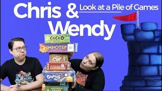 Chris and Wendy Look at a Pile of Phil Walker Harding Games