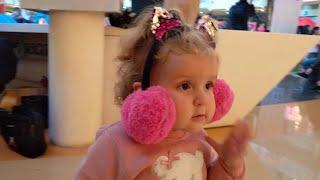 Cute baby dea wearing big earmuffs funniest home videos