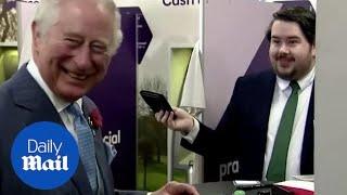 Prince Charles delighted by magic trick during south London visit