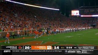 Clemson fans throw bottles on the field after onside kick call vs Louisville