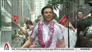 Downpour fails to rain on Team Singapore’s parade as fans turn up to honour Olympians