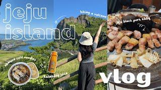 jeju island vlog | climbing a volcano (seongsan ilchulbang), trying Jeju black pork, oceanside views