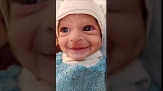 Beautiful Newborn Baby First Smile immediately after birth
