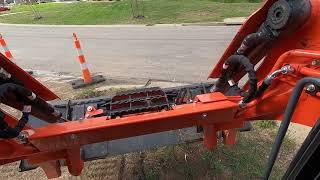 Grading out a steep slope with no room.