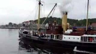 Bussard, 102 year old steamship blowing her whistle