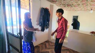 "A trip to Abu's house: meeting Banoo with Bardar and his mother, learning how to make local bread"