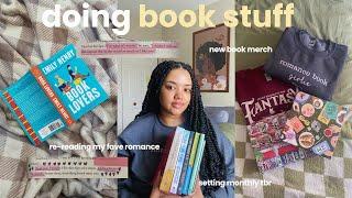 doing book stuff  | re-reading fave romance, setting my august tbr, a bookish merch haul