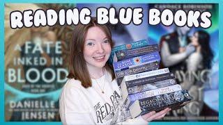 realmathon weekly reading vlog #2  reading fantasy books with blue covers for a week
