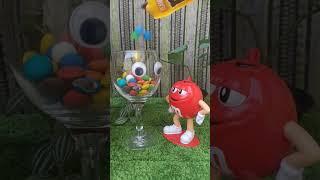 Filling m&m candies in the glass while mr. red is watching #shorts #candies #trending #youtubeshorts