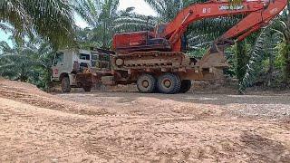 Logging Truck Hauling Doosan Excavator PC 230