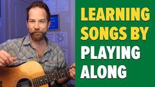 Learning Songs on Guitar – Does Playing Along Help?