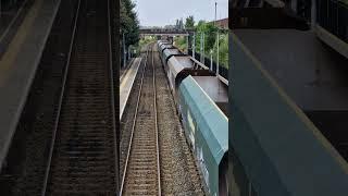 Coal train rushing through The Cotswolds 