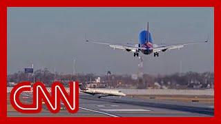 Video shows planes nearly collide at Chicago airport