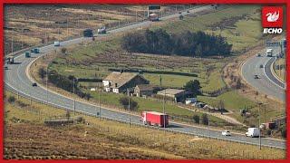 Why is there a house in the middle of the M62?