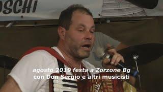 Don Sergio e altri musicisti a Zorzone nel 2019 prima parte