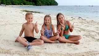 Children playing on the beach 4K