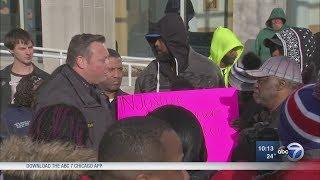 Elgin police chief answers questions at protest outside station