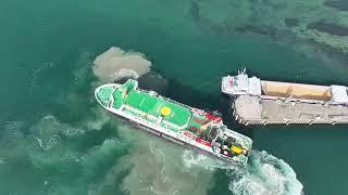 Islay Scotland 4K drone footage MV finlaggan berthing in Port Ellen