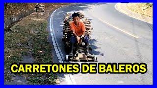 El trabajo de transportar leña en carretones de baleros y madera | El Salvador