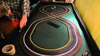 Calvin and dad slotcar racing on the atlas bulll ring