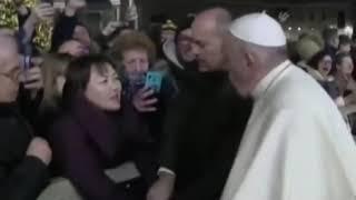 The fury of Pope Francis: Pilgrim enrages the pontiff by yanking his arm