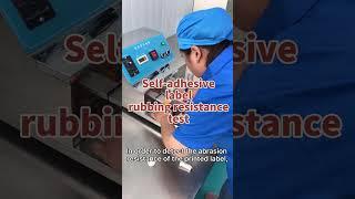 Self adhesive label rubbing resistance test