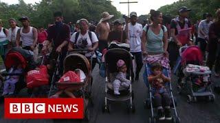 Record surge in migrants attempting to cross US-Mexico border - BBC News