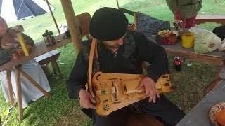 Medieval musician playing the Hurdy-Gurdy (draailier - vieille à roue)