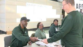 Former MSU Assistant Coach Mike Garland greets fans, signs copies of his new book at Breslin Cent...