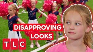 Quints Get Disapproving Looks While Cheerleading! | OutDaughtered