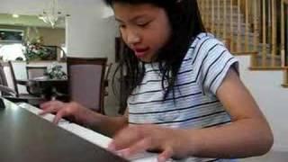 TuTran playing piano