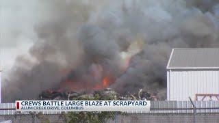 Columbus fire crews battle large blaze at scrapyard