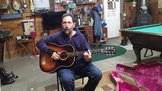 Tom playing is1960 Gibson J45 at the Bat Cave.