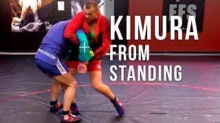 Kimura from standing. Throw over the head throw with reverse key lock grip\ sambo academy