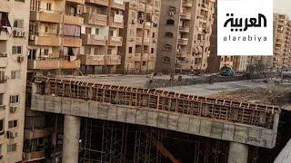 جسر يلاصق البيوت يثير الجدل في مصر