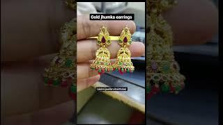 gold jhumka earrings 