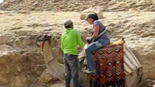 Dismounting from camels near the Middle Pyramid