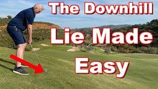 How to play the downhill lie golf shot