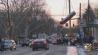 Port Authority Bus Hoisted From Site Of Pittsburgh Bridge Collapse