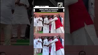 Congress’ KC Venugopal and Union Minister Giriraj share a hug at Parliament
