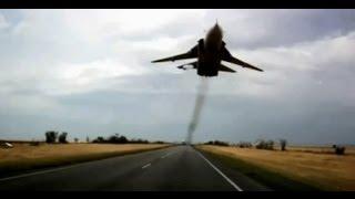 Russian Fighter Jet Flies Low Over Highway Traffic!