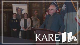 Tim Walz accepts turkey presentation as he eases back into his duties as Minnesota's governor