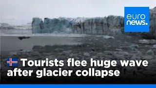 Watch: Tourists flee large wave after Icelandic glacier collapse | euronews 