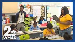 Mayor Scott gets students at Pimlico Elementary into the Halloween spirit