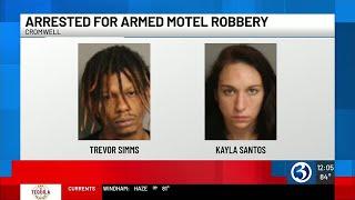 Police: 2 arrested after gunpoint robbery at motel