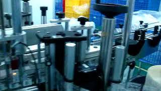 double sides labeling machine for flat bottle ）with transparent labels -Abby Huang China